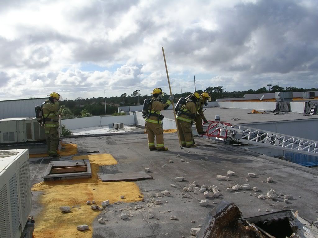 Firefighters on roof