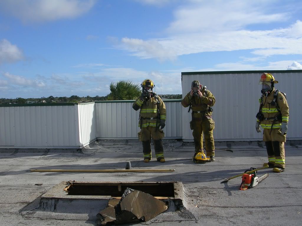 Firefighters on roof