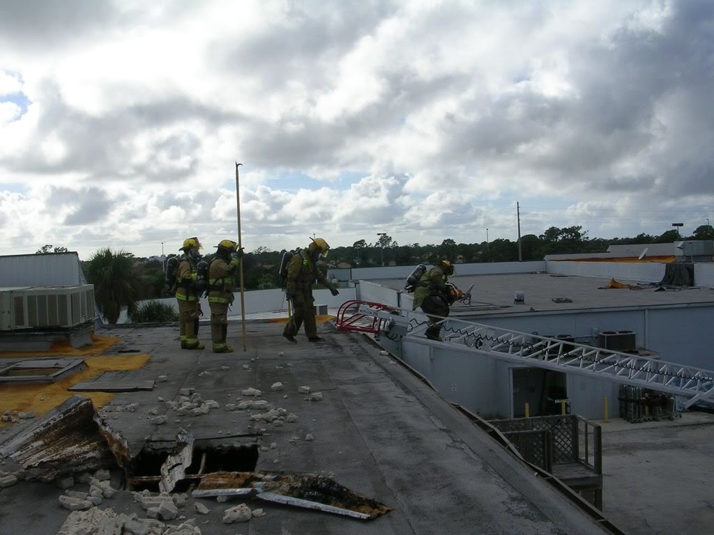 Firefighters on roof